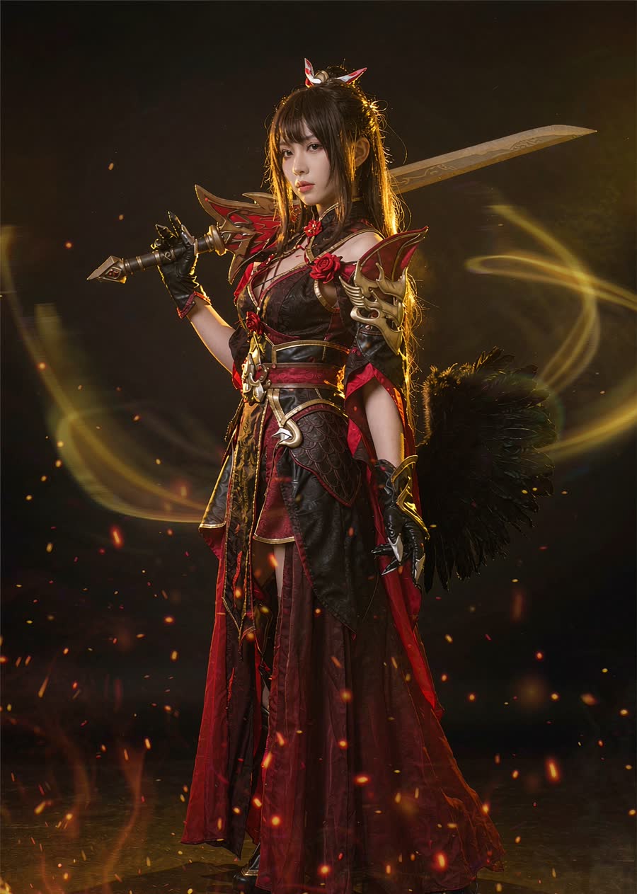 A woman dressed as a Drakania-inspired draconic armor concept — black and crimson scale dress with dragon-wing pauldron, greatsword over shoulder, warm ember backdrop.